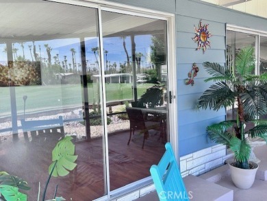 Beautiful home in Date Palm Country Club on the 14th hole of the on Date Palm Country Club in California - for sale on GolfHomes.com, golf home, golf lot