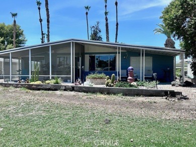 Beautiful home in Date Palm Country Club on the 14th hole of the on Date Palm Country Club in California - for sale on GolfHomes.com, golf home, golf lot