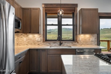 Nestled in the Grand Elk golf community this 3BD 3BA mountain on Grand Elk Ranch and Club in Colorado - for sale on GolfHomes.com, golf home, golf lot