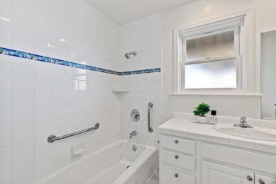 Perched on an elevated corner lot just two blocks from the on Pacific Grove Golf Links in California - for sale on GolfHomes.com, golf home, golf lot