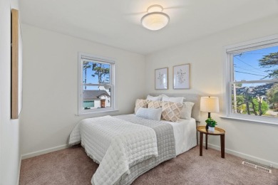Perched on an elevated corner lot just two blocks from the on Pacific Grove Golf Links in California - for sale on GolfHomes.com, golf home, golf lot