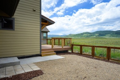 Nestled in the Grand Elk golf community this 3BD 3BA mountain on Grand Elk Ranch and Club in Colorado - for sale on GolfHomes.com, golf home, golf lot