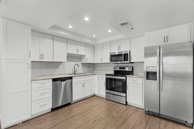 Rarely does a condo combine DESIGNER FINISHES, INSIDE LAUNDRY on Scottsdale Shadows in Arizona - for sale on GolfHomes.com, golf home, golf lot