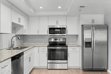 Rarely does a condo combine DESIGNER FINISHES, INSIDE LAUNDRY on Scottsdale Shadows in Arizona - for sale on GolfHomes.com, golf home, golf lot