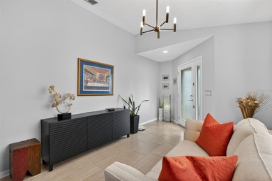 CUTE AS A BUTTON. METICULOUSLY MAINTAINED. GATED COMMUNITY WITH on Meadow Oaks Golf and Country Club in Florida - for sale on GolfHomes.com, golf home, golf lot