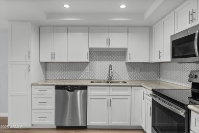 Rarely does a condo combine DESIGNER FINISHES, INSIDE LAUNDRY on Scottsdale Shadows in Arizona - for sale on GolfHomes.com, golf home, golf lot