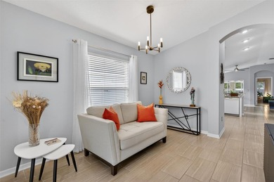 CUTE AS A BUTTON. METICULOUSLY MAINTAINED. GATED COMMUNITY WITH on Meadow Oaks Golf and Country Club in Florida - for sale on GolfHomes.com, golf home, golf lot