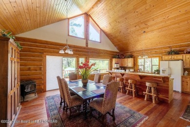 Escape to your own hand-hewn log retreat nestled in the woods of on Star Valley RV Golf Course in Wyoming - for sale on GolfHomes.com, golf home, golf lot