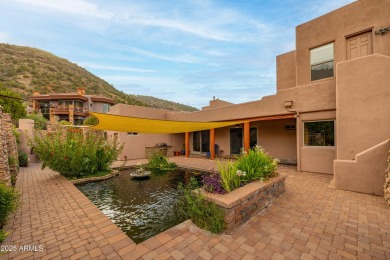 Perched on the side of a mountain and backing directly to on Sedona Golf Resort in Arizona - for sale on GolfHomes.com, golf home, golf lot