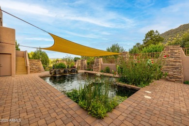 Perched on the side of a mountain and backing directly to on Sedona Golf Resort in Arizona - for sale on GolfHomes.com, golf home, golf lot