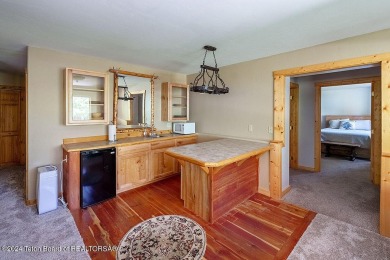 Escape to your own hand-hewn log retreat nestled in the woods of on Star Valley RV Golf Course in Wyoming - for sale on GolfHomes.com, golf home, golf lot