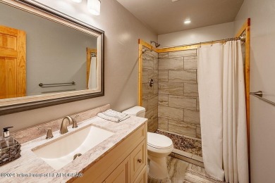 Escape to your own hand-hewn log retreat nestled in the woods of on Star Valley RV Golf Course in Wyoming - for sale on GolfHomes.com, golf home, golf lot