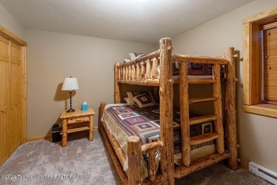 Escape to your own hand-hewn log retreat nestled in the woods of on Star Valley RV Golf Course in Wyoming - for sale on GolfHomes.com, golf home, golf lot