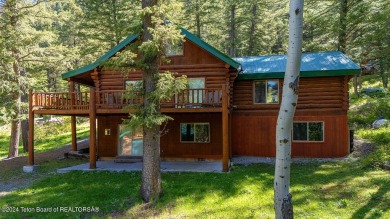 Escape to your own hand-hewn log retreat nestled in the woods of on Star Valley RV Golf Course in Wyoming - for sale on GolfHomes.com, golf home, golf lot