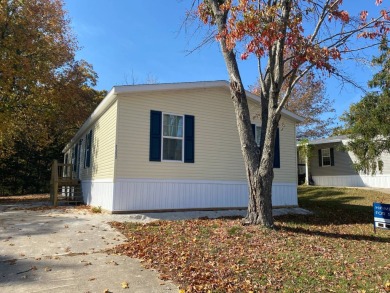 Home For Sale   4 Bedroom 2 Bath   21252 Walnut Court Unit 138 on Country Lake Golf Course in Missouri - for sale on GolfHomes.com, golf home, golf lot