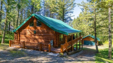 Escape to your own hand-hewn log retreat nestled in the woods of on Star Valley RV Golf Course in Wyoming - for sale on GolfHomes.com, golf home, golf lot