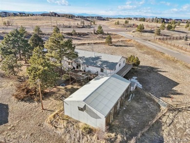 Discover the potential of this spacious ranch-style home on a on Heritage Eagle Bend Golf and Country Club in Colorado - for sale on GolfHomes.com, golf home, golf lot