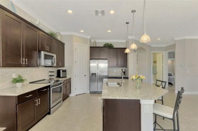 Prepare to be impressed by this meticulously maintained on Sarasota National Golf Club in Florida - for sale on GolfHomes.com, golf home, golf lot