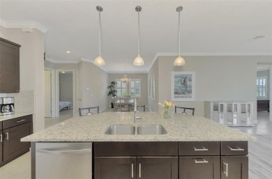 Prepare to be impressed by this meticulously maintained on Sarasota National Golf Club in Florida - for sale on GolfHomes.com, golf home, golf lot