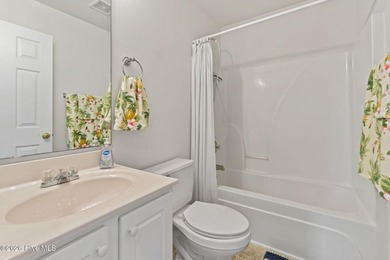 Beautifully maintained and freshly painted, this 4 bedroom, 3 on Crow Creek Golf Club in North Carolina - for sale on GolfHomes.com, golf home, golf lot