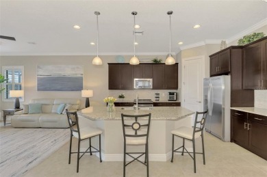 Prepare to be impressed by this meticulously maintained on Sarasota National Golf Club in Florida - for sale on GolfHomes.com, golf home, golf lot