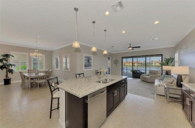 Prepare to be impressed by this meticulously maintained on Sarasota National Golf Club in Florida - for sale on GolfHomes.com, golf home, golf lot
