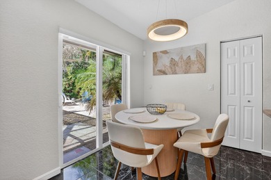 A rare find, 4 bed split on private lot surrounded by shrubs and on Boca Greens Country Club in Florida - for sale on GolfHomes.com, golf home, golf lot