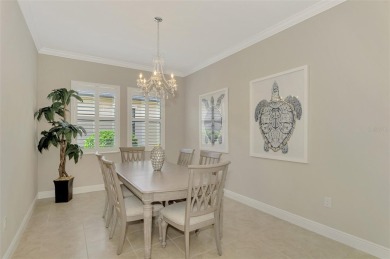 Prepare to be impressed by this meticulously maintained on Sarasota National Golf Club in Florida - for sale on GolfHomes.com, golf home, golf lot