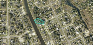 This oversized lot is just a few blocks from SR 82 and backs up on Mirror Lakes Golf Club in Florida - for sale on GolfHomes.com, golf home, golf lot