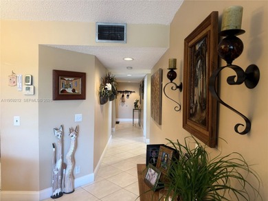 Garden View Corner Condo, featuring 2 bedrooms, 2 bathrooms on Flamingo Lakes Country Club in Florida - for sale on GolfHomes.com, golf home, golf lot
