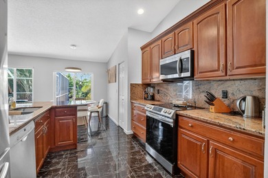 A rare find, 4 bed split on private lot surrounded by shrubs and on Boca Greens Country Club in Florida - for sale on GolfHomes.com, golf home, golf lot