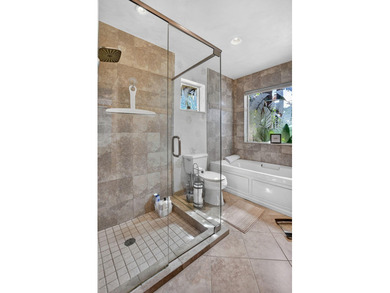 A rare find, 4 bed split on private lot surrounded by shrubs and on Boca Greens Country Club in Florida - for sale on GolfHomes.com, golf home, golf lot