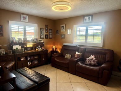 Garden View Corner Condo, featuring 2 bedrooms, 2 bathrooms on Flamingo Lakes Country Club in Florida - for sale on GolfHomes.com, golf home, golf lot