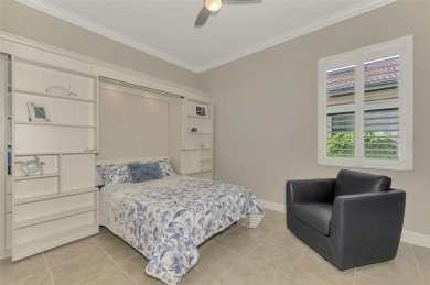 Prepare to be impressed by this meticulously maintained on Sarasota National Golf Club in Florida - for sale on GolfHomes.com, golf home, golf lot