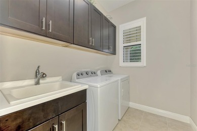 Prepare to be impressed by this meticulously maintained on Sarasota National Golf Club in Florida - for sale on GolfHomes.com, golf home, golf lot