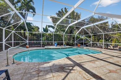 A rare find, 4 bed split on private lot surrounded by shrubs and on Boca Greens Country Club in Florida - for sale on GolfHomes.com, golf home, golf lot