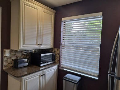 Discover serene living in this updated 2-bed, 2-bath condo in a on Oriole Golf and Tennis Club in Florida - for sale on GolfHomes.com, golf home, golf lot