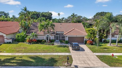 A rare find, 4 bed split on private lot surrounded by shrubs and on Boca Greens Country Club in Florida - for sale on GolfHomes.com, golf home, golf lot