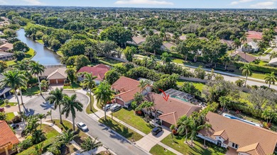 A rare find, 4 bed split on private lot surrounded by shrubs and on Boca Greens Country Club in Florida - for sale on GolfHomes.com, golf home, golf lot