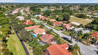 A rare find, 4 bed split on private lot surrounded by shrubs and on Boca Greens Country Club in Florida - for sale on GolfHomes.com, golf home, golf lot