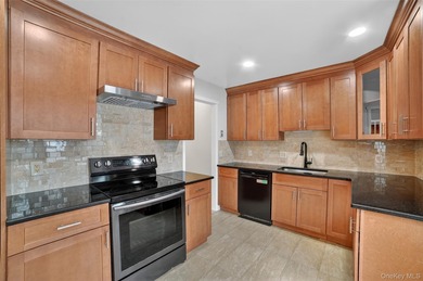 Rare end unit offering a unique and desirable layout with a on Somers Pointe Golf Club - West Hill in New York - for sale on GolfHomes.com, golf home, golf lot