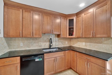 Rare end unit offering a unique and desirable layout with a on Somers Pointe Golf Club - West Hill in New York - for sale on GolfHomes.com, golf home, golf lot