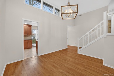 Rare end unit offering a unique and desirable layout with a on Somers Pointe Golf Club - West Hill in New York - for sale on GolfHomes.com, golf home, golf lot