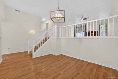 Rare end unit offering a unique and desirable layout with a on Somers Pointe Golf Club - West Hill in New York - for sale on GolfHomes.com, golf home, golf lot