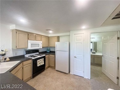 If you are looking for a charming 2-bed 2-bath condo in a gated on Stallion Mountain Golf Course in Nevada - for sale on GolfHomes.com, golf home, golf lot