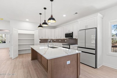 The Wow factor is what this 2600 sq ft Custom Beauty is all on Brunswick Plantation and Golf Resorts in North Carolina - for sale on GolfHomes.com, golf home, golf lot