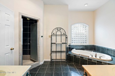 Single-Story Brick Golf Course Home with Pond View | Fairfield on Harbour Point Golf Club in North Carolina - for sale on GolfHomes.com, golf home, golf lot