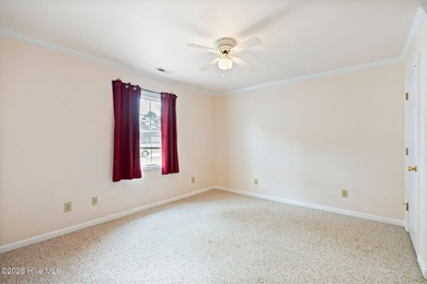 Single-Story Brick Golf Course Home with Pond View | Fairfield on Harbour Point Golf Club in North Carolina - for sale on GolfHomes.com, golf home, golf lot