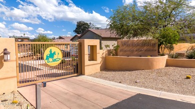 This AMAZING CUSTOM HOME offers SWEEPING MOUNTAIN VIEWS and a on Wickenburg Ranch Golf Course in Arizona - for sale on GolfHomes.com, golf home, golf lot