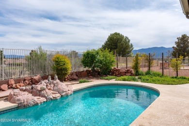 Splash into summer with a private heated pool, mature on Verde Santa Fe Golf Club in Arizona - for sale on GolfHomes.com, golf home, golf lot